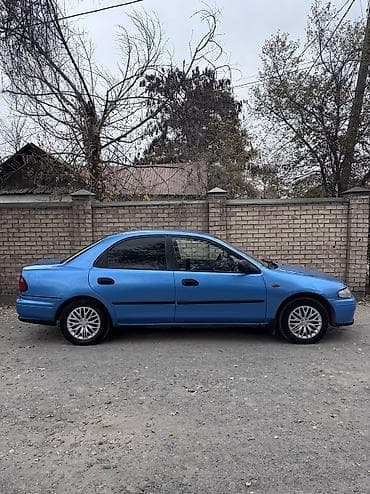 кузов маз: Mazda 323: 1999 г., 1.5 л, Ручные, Бензин, Седан — 3