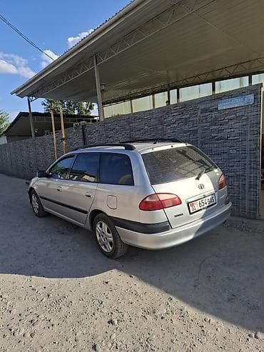 Транспорт: Toyota Avensis: 2001 г., 1.8 л, Механика, Газ, Универсал — 1