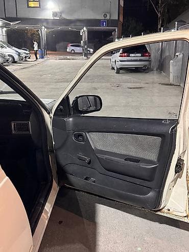 ровтер: Daewoo Nexia: 2013 г., Механика, Седан — 5