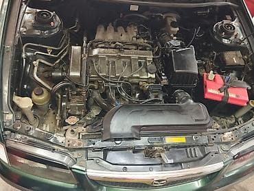 2 gz: Mazda 626: 1998 г., 1.8 л, Механика, Бензин, Хэтчбэк — 10