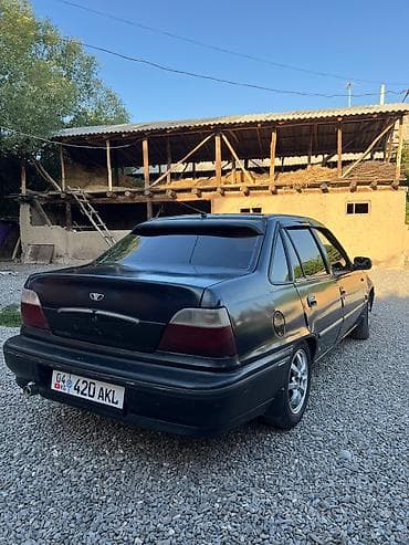 Унаа: Daewoo Nexia: 2006 г., 1.5 л, Кол менен иштөөчү, Бензин, Седан — 4