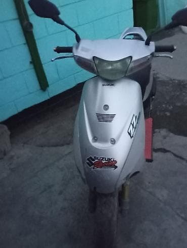 Скутерлер: Скутер Suzuki (серебристый цвет) - Марка/бренд: Suzuki - Тип — 3