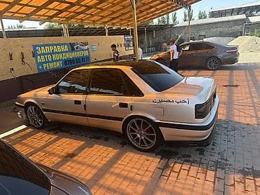 паук бмв: Mazda 626: 1988 г., 0.2 л, Механика, Бензин, Седан — 3