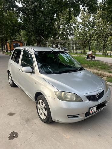 Mazda Demio: 2004 г., 1.3 л, Автомат, Бензин, Хэтчбэк