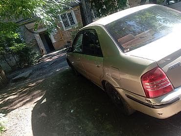 kia 5: Mazda Protege: 2001 г., 1.5 л, Автомат, Бензин, Седан — 4