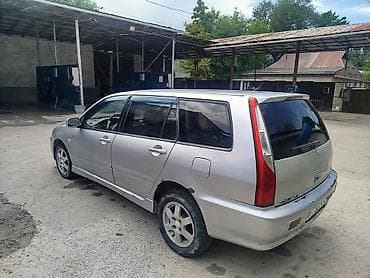 шины колеса: Mitsubishi Lancer: 2003 г., 1.6 л, Механика, Бензин, Универсал — 4