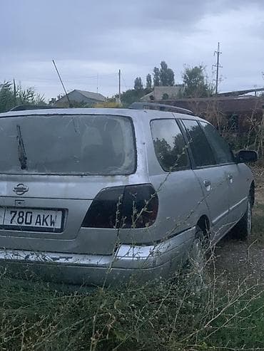 Nissan Primera: 1998 г., 2 л, Кол менен иштөөчү, Универсал — 4
