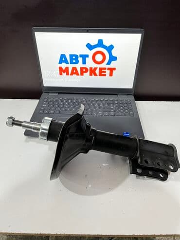 gd: Передний амортизатор Mazda 1992 г., Новый — 1