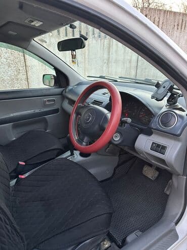 срочно продаю в связи с переездом: Mazda Demio: 2004 г., 1.5 л, Автомат, Бензин — 3