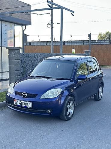 Mazda Demio: 2006 г., 1.3 л, Автомат, Бензин, Хэтчбэк