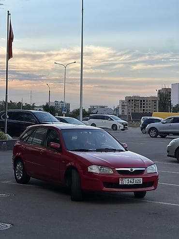 авто лейлек: Mazda 323: 1998 г., 1.5 л, Кол менен иштөөчү, Бензин, Универсал — 3