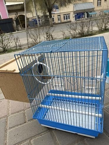 Клетка для маленьких птиц с домиком-гнездом. - Материал