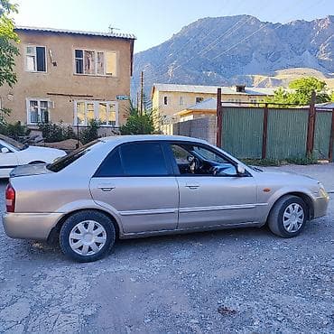 бутка бу: Mazda Familia: 2002 г., 1.6 л, Автомат, Бензин, Седан — 7