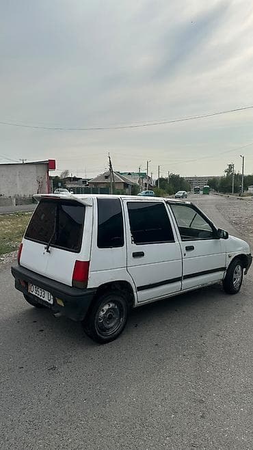 Продажа авто: Компактный городской хэтчбек 5 дверей, белый цвет. Особенности и — 5