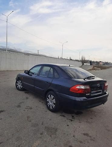 3 ряд gx: Mazda 626: 2000 г., 1.8 л, Механика, Бензин, Седан — 3