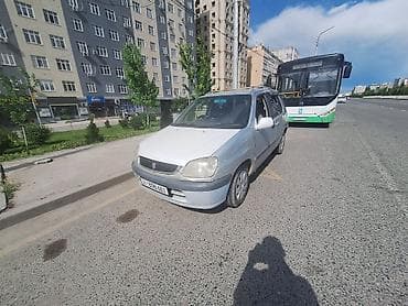 town ace: Toyota Raum: 1999 г., 1.5 л, Автомат — 1