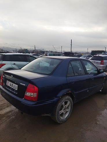mazda 323 f: Mazda 323: 1999 г., 1.6 л, Ручные, Бензин, Седан — 2