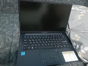 macbook pro 2010: ASUS VivoBook 14 (серия X1404VA) Ключевые характеристики по наклейкам — 5
