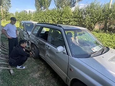 210 e55: Subaru Forester: 2000 г., 2 л, Автомат, Газ, Универсал — 9