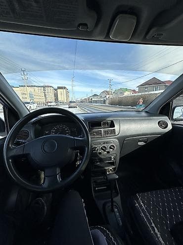 matiz 2008: Daihatsu Cuore: 2003 г., 1 л, Автомат, Бензин, Хэтчбэк — 5