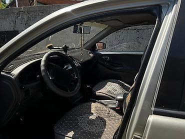 китайские машины электро: Daewoo Leganza: 2002 г., 2 л, Механика, Гибрид, Седан — 5