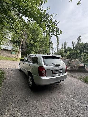 пасат бы 3: Mazda Familia: 2002 г., 1.3 л, Бензин, Универсал — 3