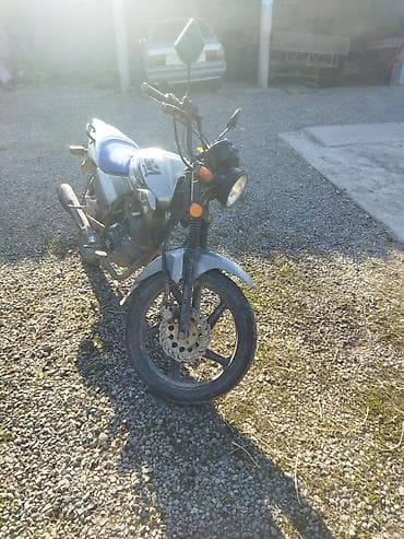 mazda 121: Мотоцикл дорожный/городской класс 150см³ (визуально — компактный — 1