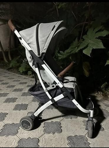 коляска стокк: Легкая прогулочная коляска-трость - Компактное шасси с передними — 1