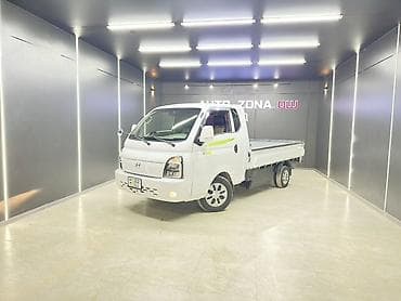 pm 2 5: Hyundai Porter II EV — компактный электрический бортовой грузовик — 2