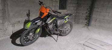 Oldsmobile: Эндуро мотоцикл Zuumav К5, оранжево‑черный. Основные особенности: - — 3