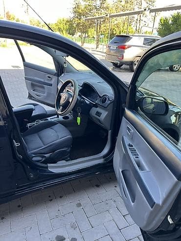 mazda cronos: Mazda Demio: 2004 г., 1.3 л, Автомат, Бензин, Хэтчбэк — 6