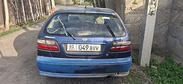 Nissan Almera: 1999 г., Механика, Седан — 6
