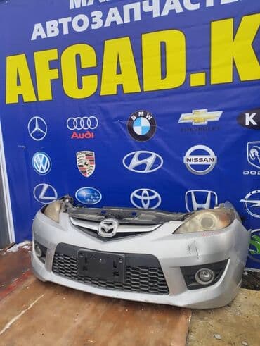 Кузовные детали: Бампер Mazda, Б/у, Оригинал — 1
