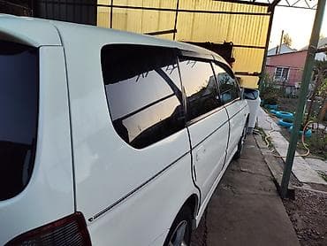 а 8: Honda Odyssey: 2001 г., Универсал — 4
