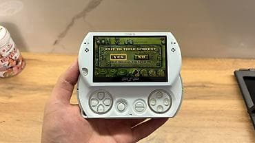 кен булун: PSP Go (16Gb, White) - состояние очень хорошее, приставка чистая, в — 2