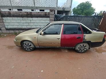 Унаа: Daewoo Nexia: 2012 г., 1.5 л, Кол менен иштөөчү, Бензин, Седан — 5