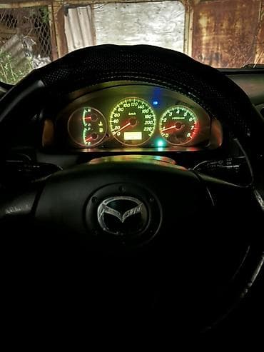 салон жасайбыз: Mazda 323: 2001 г., 1.6 л, Кол менен иштөөчү, Хетчбек — 10