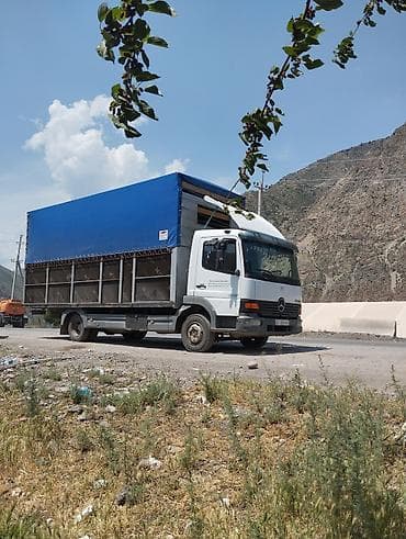 грузовой фуры: Грузоперевозки на тентованном бортовом грузовике Mercedes-Benz Atego — 1