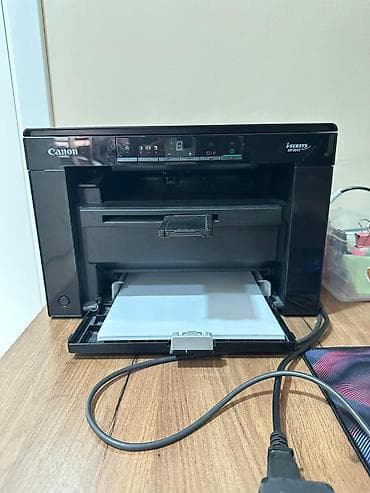 Принтер 3/1 Canon i-SENSYS mfu 3010 черного цвета обеспечивает быструю