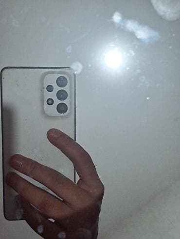 Смартфон с многообъективной основной камерой (модуль из четырёх камер