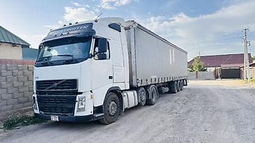 belarus 82: Тягач, Volvo, 2005 г., Тентованный — 1