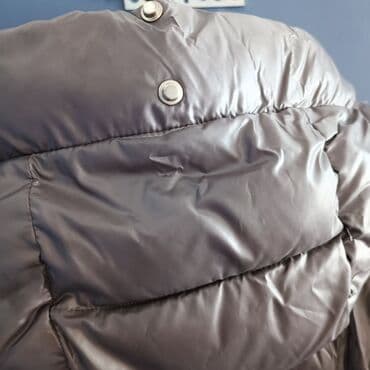 спортивное оборудование: Фирменный зимний пуховик 48-го размера. Состояние отличное — 5