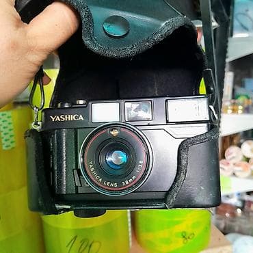 Пленочный фотоаппарат Yashica с кожаным футляром - Тип: компактная — 4
