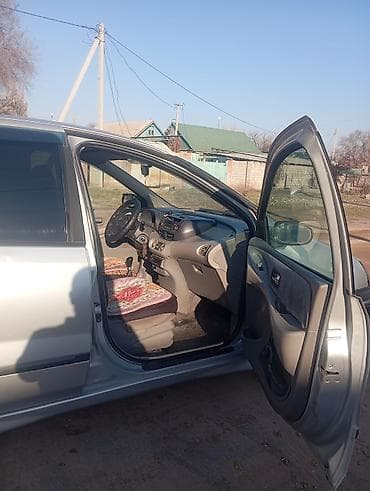 иж орион: Nissan Almera Tino: 2001 г., 1.8 л, Ручные, Бензин, Хэтчбэк — 6