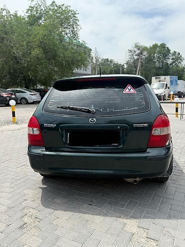 mazda demio решотка: Mazda 323: 2000 г., 1.5 л, Автомат, Бензин, Хэтчбэк — 8