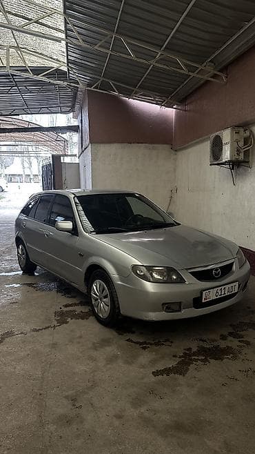 продаю трактор мтз 80: Mazda 323: 2003 г., 1.6 л, Механика, Бензин, Хэтчбэк — 3