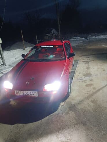 фары на велосипед: Mazda 323: 1994 г., 1.5 л, Механика, Бензин, Хэтчбэк — 9