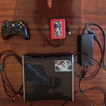 Портативные консоли: Игровая консоль Xbox 360 (Slim). Комплектация: - консоль Xbox 360 — 1
