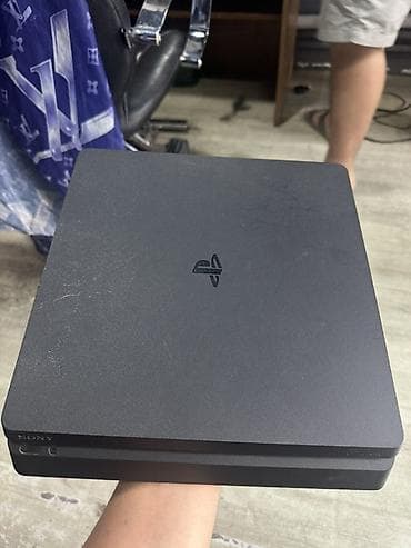 игровой моноблок: Sony PlayStation 4 Slim (чёрная) - Оригинальная игровая консоль PS4 — 1