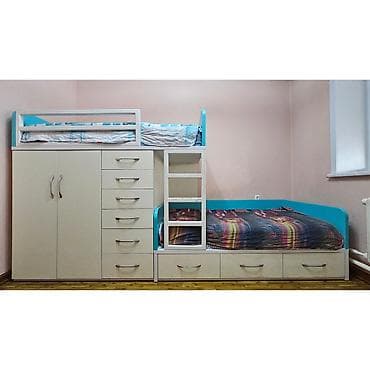 Двухъярусная детская кровать с системой хранения и лестницей. длина